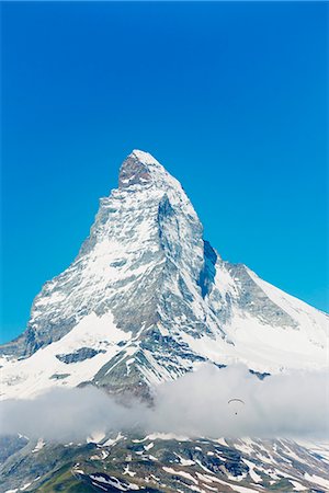 sommet (montagne) - Paraglider flying near the Matterhorn, 4478m, Zermatt, Valais, Swiss Alps, Switzerland, Europe Photographie de stock - Premium Libres de Droits, Code: 6119-07452411