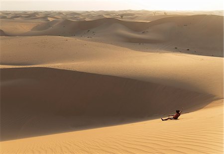 sliding - The desert near Liwa, Abu Dhabi, United Arab Emirates, Middle East Stock Photo - Premium Royalty-Free, Code: 6119-07452761