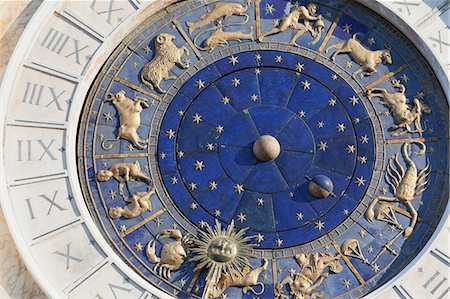 Detail of clock on the Torre dell' Orologio in St. Mark's Square, Venice, UNESCO World Heritage Site, Veneto, Italy, Europe Stock Photo - Premium Royalty-Free, Code: 6119-07452793