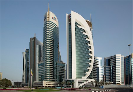 doha qatar skyline skyscraper - Futuristic skyscrapers downtown in Doha, Qatar, Middle East Stock Photo - Premium Royalty-Free, Code: 6119-07452732