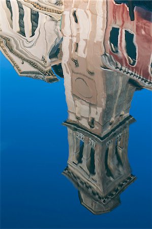 Reflection of San Trovaso church in a still canal in the Dorsoduro area, Venice, UNESCO World Heritage Site, Veneto, Italy, Europe Stock Photo - Premium Royalty-Free, Code: 6119-07452810