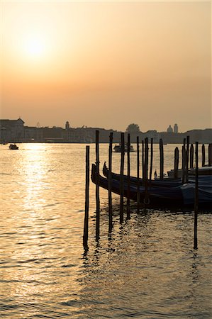 simsearch:6119-07452812,k - Gondolas moored at Campo della Salute on the Grand Canal at sunrise, Venice, UNESCO World Heritage Site, Veneto, Italy, Europe Stock Photo - Premium Royalty-Free, Code: 6119-07452827