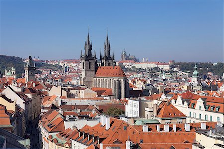View over the Old Town (Stare Mesto) with Old Town Hall, Tyn Cathedral (Church of Our Lady Before Tyn) to Castle District with Royal Palace and St. Vitus Cathedral, Prague, Bohemia, Czech Republic, Europe Stock Photo - Premium Royalty-Free, Code: 6119-07587374