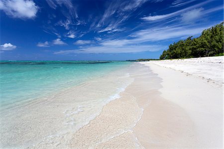 Idyllic beach scene with blue sky, aquamarine sea and soft sand, Ile Aux Cerfs, Mauritius, Indian Ocean, Africa Stock Photo - Premium Royalty-Free, Code: 6119-07744589