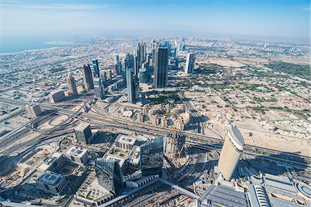 View over Dubai from Burj Khalifa, Dubai, United Arab Emirates, Middle East Stock Photo - Premium Royalty-Free, Code: 6119-07744666
