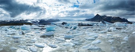 simsearch:6119-07781100,k - Panoramic view of Fjallsarlon, a glacial lake fed by Fjallsjokull at the south end of the Vatnajokull icecap showing icebergs floating on the surface of the lake, near Jokulsarlon, South Iceland, Iceland, Polar Regions Photographie de stock - Premium Libres de Droits, Code: 6119-07781094