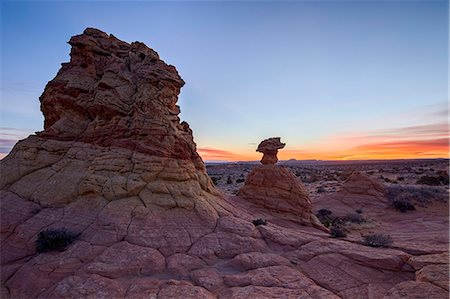 Sandstone formation at dawn with orange clouds, Coyote Buttes Wilderness, Vermilion Cliffs National Monument, Arizona, United States of America, North America Stock Photo - Premium Royalty-Free, Code: 6119-07781196