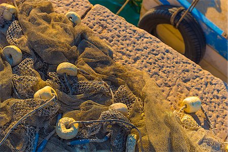 Fishing nets and fishing boat, Old Town Harbour, Piran, Primorska, Slovenia, Europe Stock Photo - Premium Royalty-Free, Code: 6119-07781301