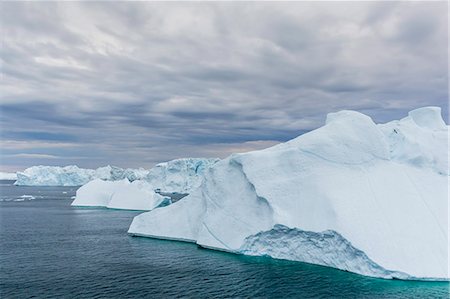 Huge icebergs calved from the Ilulissat Glacier, UNESCO World Heritage Site, Ilulissat, Greenland, Polar Regions Stock Photo - Premium Royalty-Free, Code: 6119-07734893