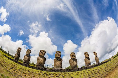 Seven Moai at Ahu Akivi, the first restored altar, Rapa Nui National Park, UNESCO World Heritage Site, Easter Island (Isla de Pascua), Chile, South America Stock Photo - Premium Royalty-Free, Code: 6119-07734941