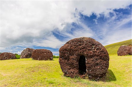 The red scoria quarry at Puna Pau, a cinder cone on the outskirts of Hanga Roa, Rapa Nui National Park, UNESCO World Heritage Site, Easter Island (Isla de Pascua), Chile, South America Stock Photo - Premium Royalty-Free, Code: 6119-07734945