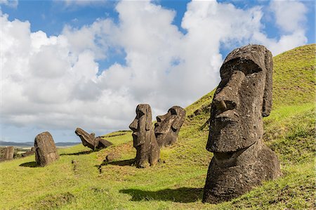 simsearch:649-09111444,k - Moai sculptures in various stages of completion at Rano Raraku, the quarry site for all moai on Easter Island, Rapa Nui National Park, UNESCO World Heritage Site, Easter Island (Isla de Pascua), Chile, South America Stock Photo - Premium Royalty-Free, Code: 6119-07734948