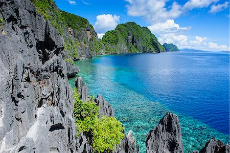 places in the philippines - Crystal clear water in the Bacuit archipelago, Palawan, Philippines, Southeast Asia, Asia Foto de stock - Sin royalties Premium, Código: 6119-07735075