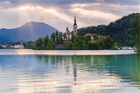 simsearch:6119-07452540,k - Lake Bled sunrise landscape, showing Lake Bled Church on the Island, Gorenjska Region, Slovenia, Europe Stock Photo - Premium Royalty-Free, Code: 6119-07845409