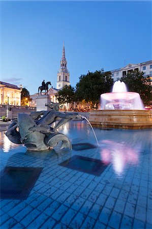 Fountain with statue of George IV and St. Martin-in-the-Fields church, Trafalgar Square, London, England, United Kingdom, Europe Stock Photo - Premium Royalty-Free, Code: 6119-07845516