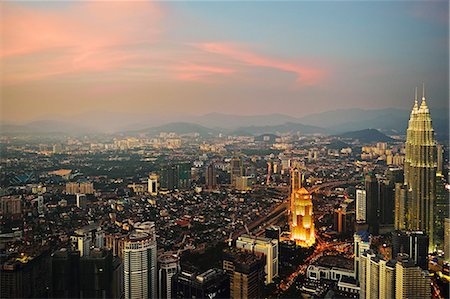 Kuala Lumpur skyline seen from KL Tower, Kuala Lumpur, Malaysia, Southeast Asia, Asia Foto de stock - Royalty Free Premium, Número: 6119-07845605