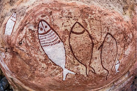 rock painting aboriginal - Aboriginal Wandjina cave artwork in sandstone caves at Raft Point, Kimberley, Western Australia, Australia, Pacific Stock Photo - Premium Royalty-Free, Code: 6119-07943683