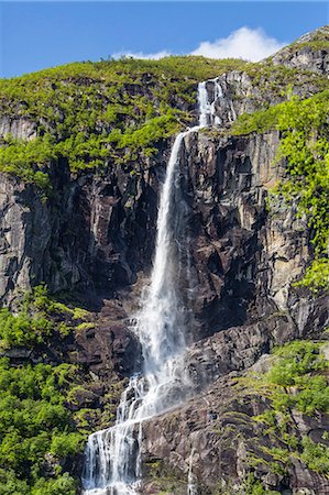 Ice melt waterfall on the Olden River as it flows along Briksdalen, Olden, Nordfjord, Norway, Scandinavia, Europe Stock Photo - Premium Royalty-Free, Code: 6119-07943628