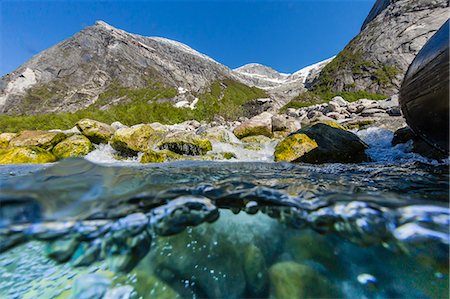 simsearch:6119-07943628,k - Above and below view of ice melt waterfall cascading down in Svartisen National Park, Melfjord, Nordfjord, Norway, Scandinavia, Europe Stock Photo - Premium Royalty-Free, Code: 6119-07943631