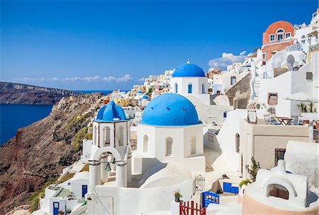 simsearch:400-04468669,k - Greek church with three blue domes in the village of Oia, Santorini (Thira), Cyclades Islands, Greek Islands, Greece, Europe Stock Photo - Premium Royalty-Free, Code: 6119-07943839