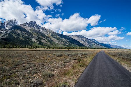 flat road perspective - The Teton range in the Grand Teton National Park, Wyoming, United States of America, North America Stock Photo - Premium Royalty-Free, Code: 6119-07944023