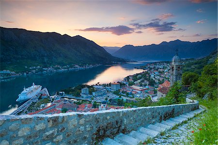 stair nobody sky - Elevated view over Kotor's Stari Grad (Old Town) and The Bay of Kotor at sunset, Kotor, UNESCO World Heritage Site, Montenegro, Europe Stock Photo - Premium Royalty-Free, Code: 6119-08061970