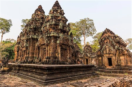 Ornate carvings in red sandstone at Banteay Srei Temple in Angkor, UNESCO World Heritage Site, Siem Reap, Cambodia, Indochina, Southeast Asia, Asia Stock Photo - Premium Royalty-Free, Code: 6119-08061937