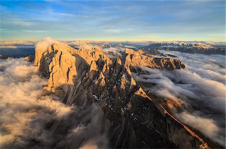 The pinnacles of the Odle Group (Geisler) emerging from the fog, Dolomites, South Tyrol, Italy, Europe Stock Photo - Premium Royalty-Free, Code: 6119-08062055