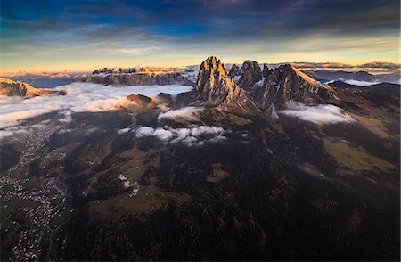 A spectacular view over Sassopiatto (Plattkofel), Sassolungo (Langkofel), the Rolle Group and the Gardena Valley, South Tyrol, Dolomites, Italy, Europe Stock Photo - Premium Royalty-Free, Code: 6119-08062056