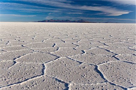 plat (surface) - White, translucent salt crystals in the largest salt desert in the world, Salar de Uyuni, Bolivia, South America Photographie de stock - Premium Libres de Droits, Code: 6119-08062155
