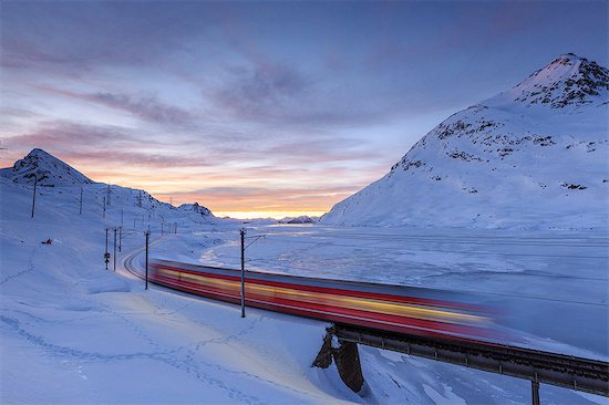 The Bernina Express red train, UNESCO World Heritage Site, Graubunden, Swiss Alps, Switzerland, Europe Stock Photo - Premium Royalty-Free, Image code: 6119-08062112