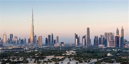 Elevated view of the new Dubai skyline, the Burj Khalifa, modern architecture and skyscrapers on Sheikh Zayed Road, Dubai, United Arab Emirates, Middle East Stock Photo - Premium Royalty-Free, Code: 6119-08081163