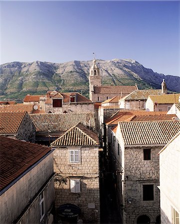 simsearch:841-03057304,k - Elevated view of Korcula town looking across to the Peljesac Peninsula, Korcula Island, Dalmatia, Dalmatian coast, Croatia, Europe Foto de stock - Royalty Free Premium, Número: 6119-08266313