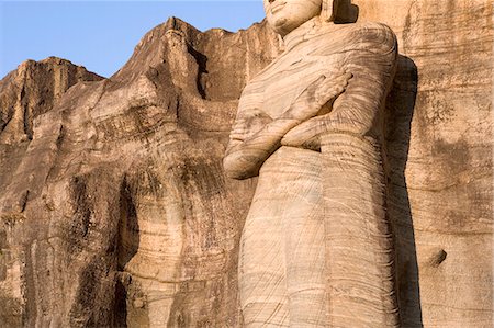 Rock carved granite image of the 7m tall standing Buddha, Gal Vihara, Polonnaruwa (Polonnaruva), UNESCO World Heritage Site, Sri Lanka, Asia Stock Photo - Premium Royalty-Free, Code: 6119-08266319