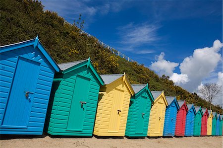 simsearch:400-07832547,k - Multicoloured beach huts on the long sweeping beach of Llanbedrog, Llyn Peninsula, Gwynedd, North Wales, Wales, United Kingdom, Europe Fotografie stock - Premium Royalty-Free, Codice: 6119-08267351