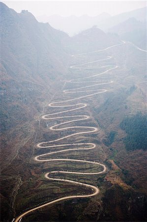 A winding mountain road, China, Asia Stock Photo - Premium Royalty-Free, Code: 6119-08267925