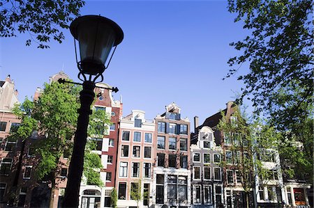 Gabled houses on the Prinsengracht, Amsterdam, Netherlands, Europe Stock Photo - Premium Royalty-Free, Code: 6119-08269494