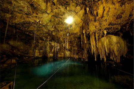 Cenote Dzitnup, underground sinkholes which has only one natural source of light, Yucatan, Mexico, North America Photographie de stock - Premium Libres de Droits, Code: 6119-08269426