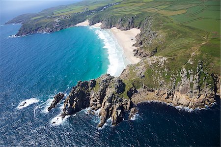 simsearch:6119-08269962,k - Aerial photo of Treen Cliff and Porthcurno beach looking west to the Minnack Theatre, West Penwith, Cornwall, England, United Kingdom, Europe Foto de stock - Sin royalties Premium, Código: 6119-08269980