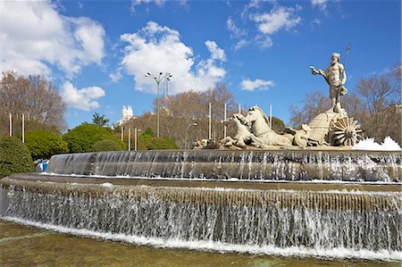 fountain of neptune - Neptune Fountain, Canovas del Castillo Square, Paseo del Prado, Madrid, Spain, Europe Foto de stock - Sin royalties Premium, Código: 6119-08269937