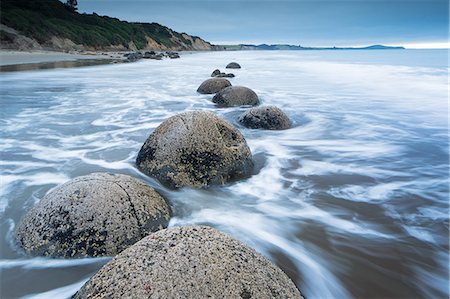 Moeraki boulders, Moeraki, Otago, South Island, New Zealand, Pacific Stock Photo - Premium Royalty-Free, Code: 6119-08351262