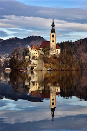 Lake Bled at dawn with Santa Maria Church (Church of Assumption), Gorenjska, Julian Alps, Slovenia, Europe Stock Photo - Premium Royalty-Free, Code: 6119-08568324