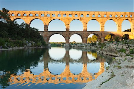 famous river - Pont du Gard, Roman aqueduct, UNESCO World Heritage Site, River Gard, Languedoc-Roussillon, France, Europe Stock Photo - Premium Royalty-Free, Code: 6119-08517994