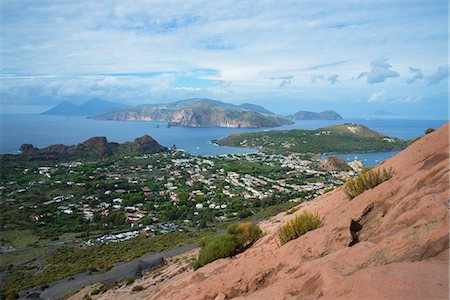 Porto di Levante and Vulcanello view, Aeolian Islands in the background, Vulcano Island, Aeolian Islands, UNESCO World Heritage Site, north of Sicily, Italy, Mediterranean, Europe Foto de stock - Sin royalties Premium, Código: 6119-08518077