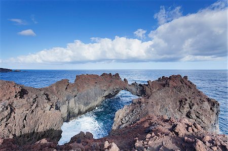 Rock arch, Arco de la Tosca at Punta de la Dehesa, lava coast, UNESCO biosphere reserve, El Hierro, Canary Islands, Spain, Atlantic, Europe Foto de stock - Sin royalties Premium, Código: 6119-08518013