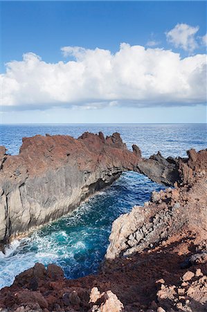 famoso - Rock arch, Arco de la Tosca at Punta de la Dehesa, lava coast, UNESCO biosphere reserve, El Hierro, Canary Islands, Spain, Atlantic, Europe Photographie de stock - Premium Libres de Droits, Code: 6119-08518014