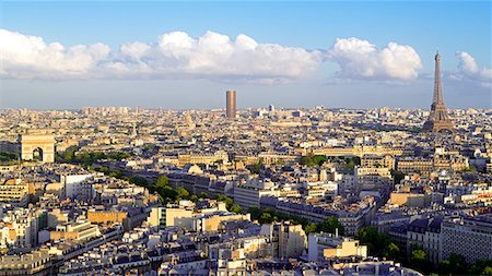 pictures of famous places in france - City, Arc de Triomphe and the Eiffel Tower, viewed over rooftops, Paris, France, Europe Stock Photo - Premium Royalty-Free, Code: 6119-08518109