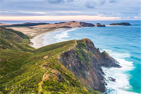 simsearch:862-07690519,k - Te Werahi Beach at sunrise, with Te Paki Coastal Track path visible, Cape Reinga, North Island, New Zealand, Pacific Photographie de stock - Premium Libres de Droits, Code: 6119-08641069