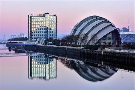 reflection and symmetry - Sunrise at The Clyde Auditorium (the Armadillo), Glasgow, Scotland, United Kingdom, Europe Stock Photo - Premium Royalty-Free, Code: 6119-08641139