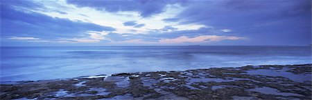 farne islands - View across North Sea towards Farne Islands at dusk, from Bamburgh, Northumberland (Northumbria), England, United Kingdom, Europe Photographie de stock - Premium Libres de Droits, Code: 6119-08740004